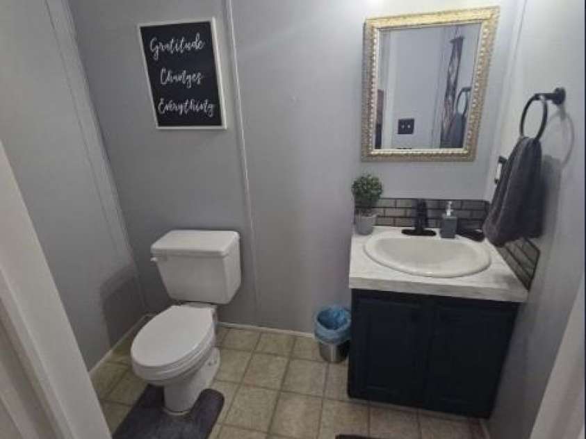 1597 Cleghorn Mill Road, Rutherfordton, NC 28139.  MLS# CAR4213254, YatesRealty ID 627. Half Bathroom beside the utility area. 