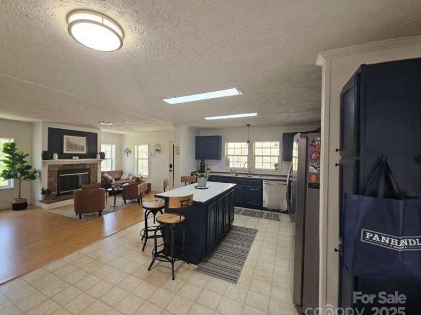 1597 Cleghorn Mill Road, Rutherfordton, NC 28139.  MLS# CAR4213254, YatesRealty ID 627. Open floor plan from kitchen to living areas. 