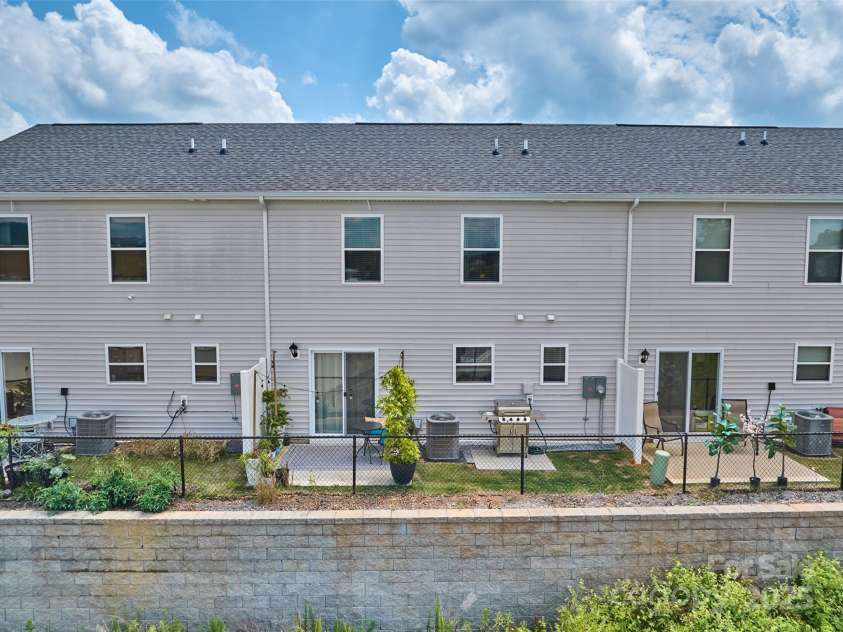 64 Benedict Lane, Weaverville, NC 28787.  MLS# CAR4208936, YatesRealty ID 627. Close up rear view of building