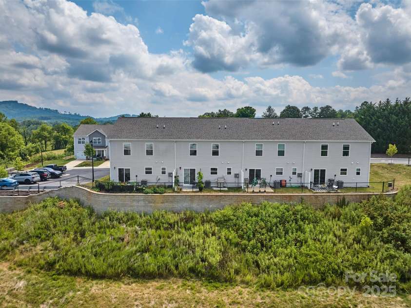 64 Benedict Lane, Weaverville, NC 28787.  MLS# CAR4208936, YatesRealty ID 627. Rear view of building