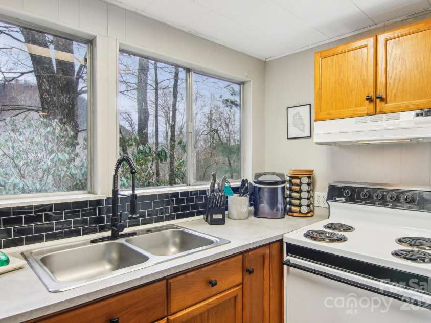 155 Mull Cove Road, Maggie Valley, NC 28751.  MLS# CAR4211776, YatesRealty ID 6271. 