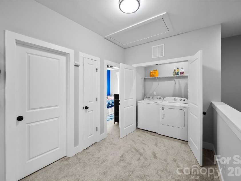 3422 Peligreni Street, Charlotte, NC 28208.  MLS# CAR4361494, YatesRealty ID 6271. Laundry room- Upper