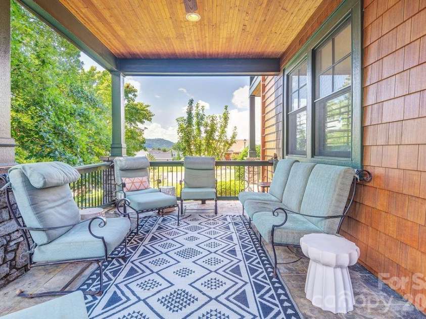 3 Gale Kelly Court, Weaverville, NC 28787.  MLS# CAR4361031, YatesRealty ID 6275. Covered outdoor patio with mountain views