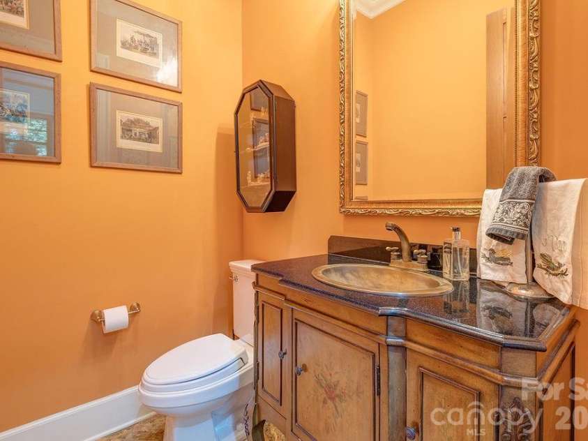 3 Gale Kelly Court, Weaverville, NC 28787.  MLS# CAR4361031, YatesRealty ID 6275. Main level half bath