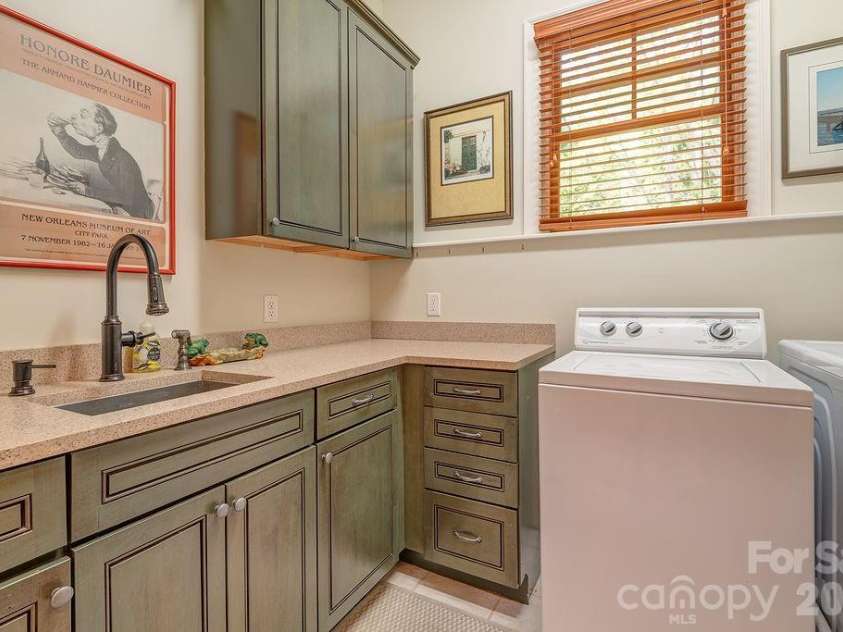 3 Gale Kelly Court, Weaverville, NC 28787.  MLS# CAR4361031, YatesRealty ID 6275. Main level laundry room