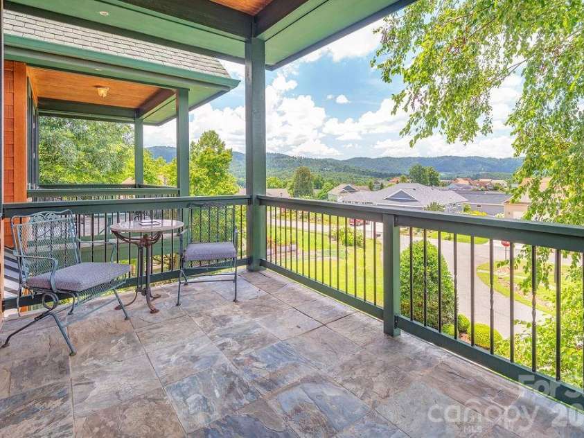 3 Gale Kelly Court, Weaverville, NC 28787.  MLS# CAR4361031, YatesRealty ID 6275. Upstairs bedrooms with private balconies and mountain views