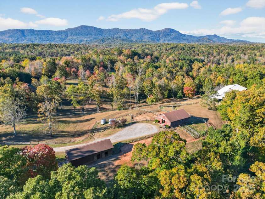 777 River Road, Tryon, NC 28782.  MLS# CAR4316725, YatesRealty ID 6286. Aerial - Pasture