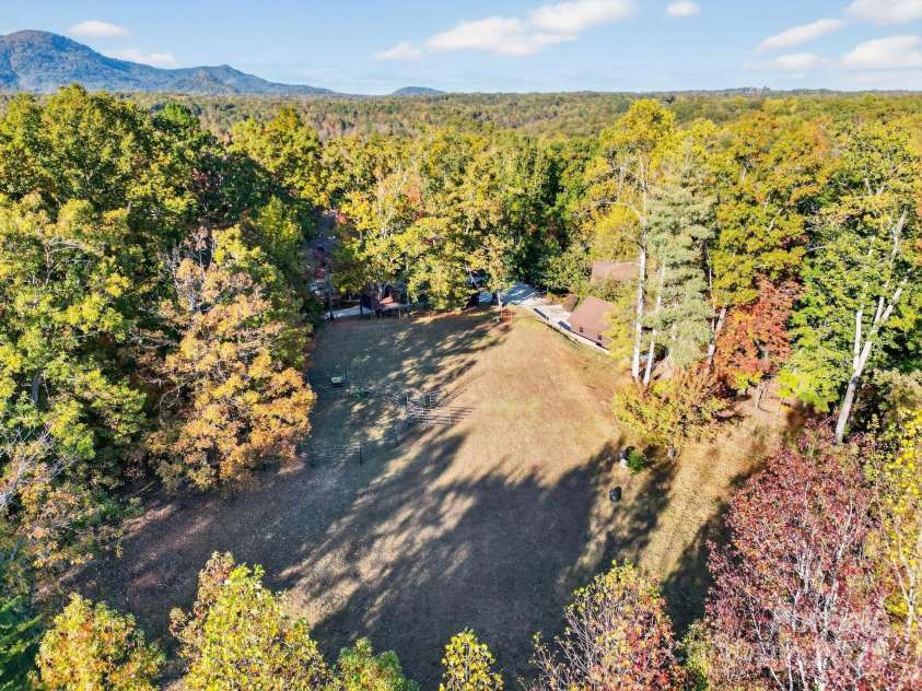 777 River Road, Tryon, NC 28782.  MLS# CAR4316725, YatesRealty ID 6286. Aerial - Pasture