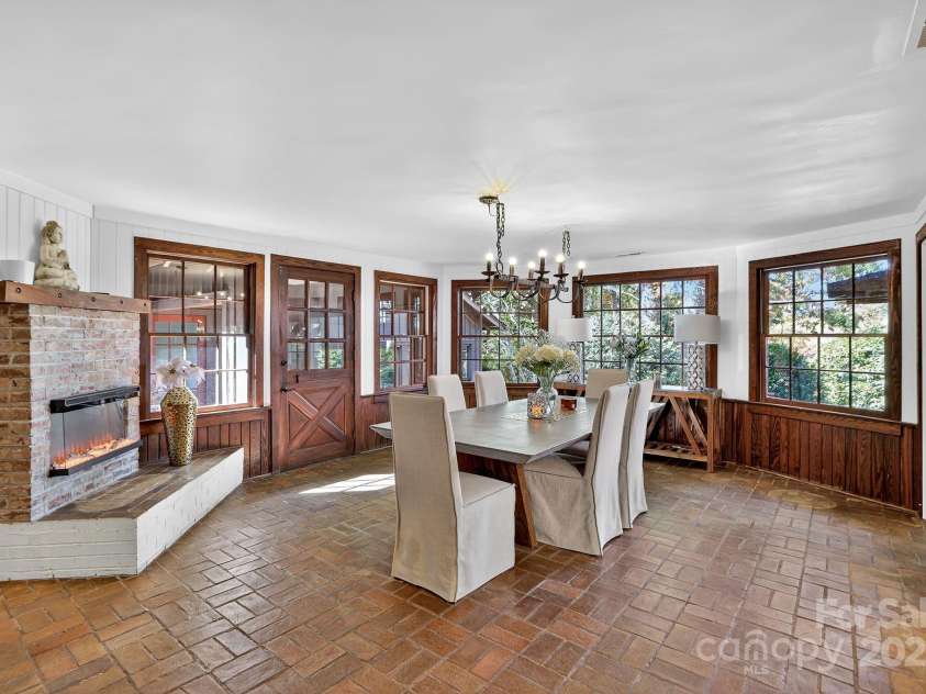777 River Road, Tryon, NC 28782.  MLS# CAR4316725, YatesRealty ID 6286. Primary House Dining
