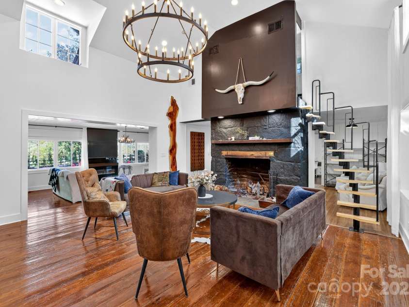 777 River Road, Tryon, NC 28782.  MLS# CAR4316725, YatesRealty ID 6286. Primary House Living Room