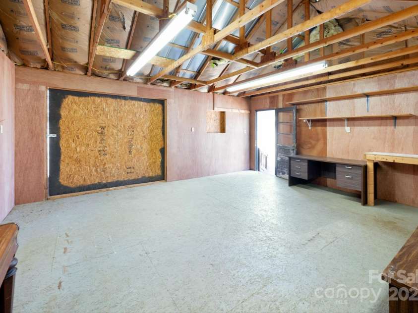 1022 Phipps Creek Road, Burnsville, NC 28714.  MLS# CAR4235645, YatesRealty ID 6287. Endless Potential to do woodwork