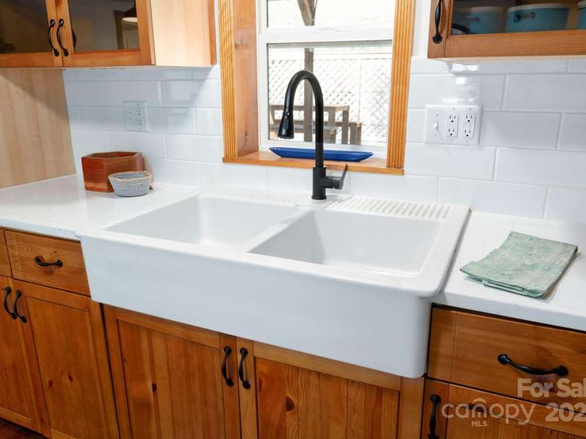 1022 Phipps Creek Road, Burnsville, NC 28714.  MLS# CAR4235645, YatesRealty ID 6287. Large Farm Sink Great for Food Prep