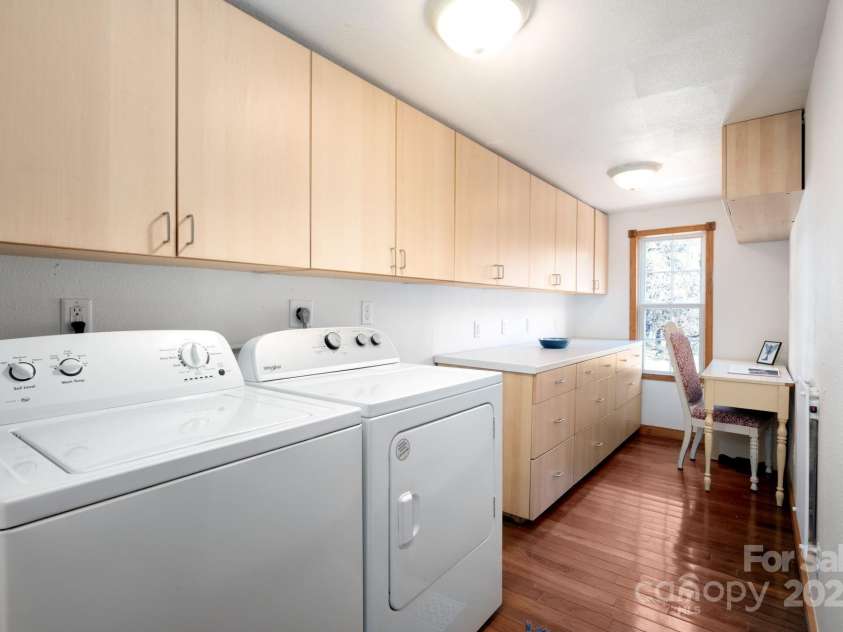 1022 Phipps Creek Road, Burnsville, NC 28714.  MLS# CAR4235645, YatesRealty ID 6287. Laundry Room with Tons of Storage