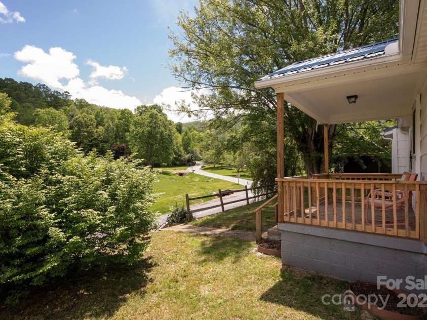 1022 Phipps Creek Road, Burnsville, NC 28714.  MLS# CAR4235645, YatesRealty ID 6287. Mountain Views From Front Porch
