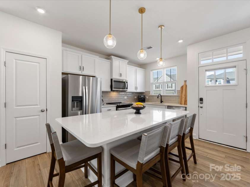 1542 Cedar Tree Drive, Belmont, NC 28012.  MLS# CAR4238594, YatesRealty ID 6288. Large island seats 4