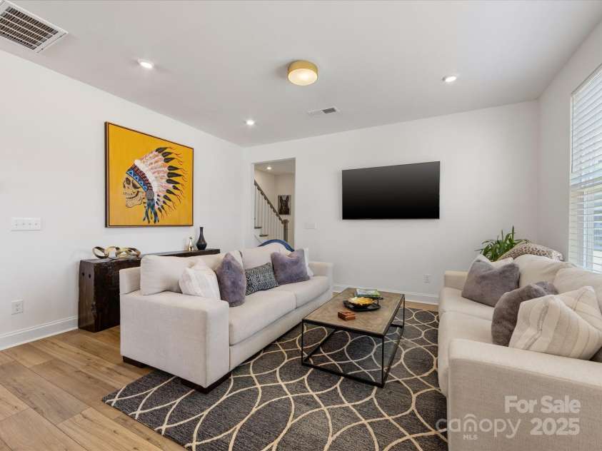 1542 Cedar Tree Drive, Belmont, NC 28012.  MLS# CAR4238594, YatesRealty ID 6288. Light filled family room