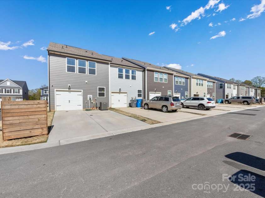 1542 Cedar Tree Drive, Belmont, NC 28012.  MLS# CAR4238594, YatesRealty ID 6288. Rear garage with oversized driveway