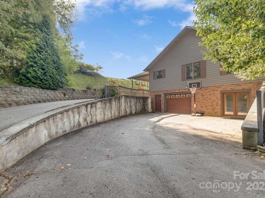 57 Stillwater Springs Road, Burnsville, NC 28714.  MLS# CAR4295423, YatesRealty ID 629. 57 Stillwater Springs Road Burnsville, NC