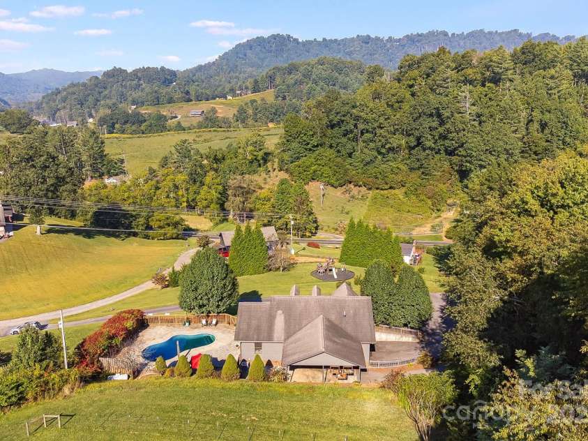 57 Stillwater Springs Road, Burnsville, NC 28714.  MLS# CAR4295423, YatesRealty ID 629. Aerial 57 Stillwater Springs Road Burnsville, NC
