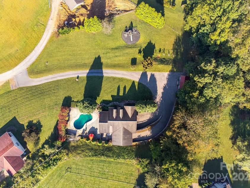 57 Stillwater Springs Road, Burnsville, NC 28714.  MLS# CAR4295423, YatesRealty ID 629. Aerial 57 Stillwater Springs Road Burnsville, NC