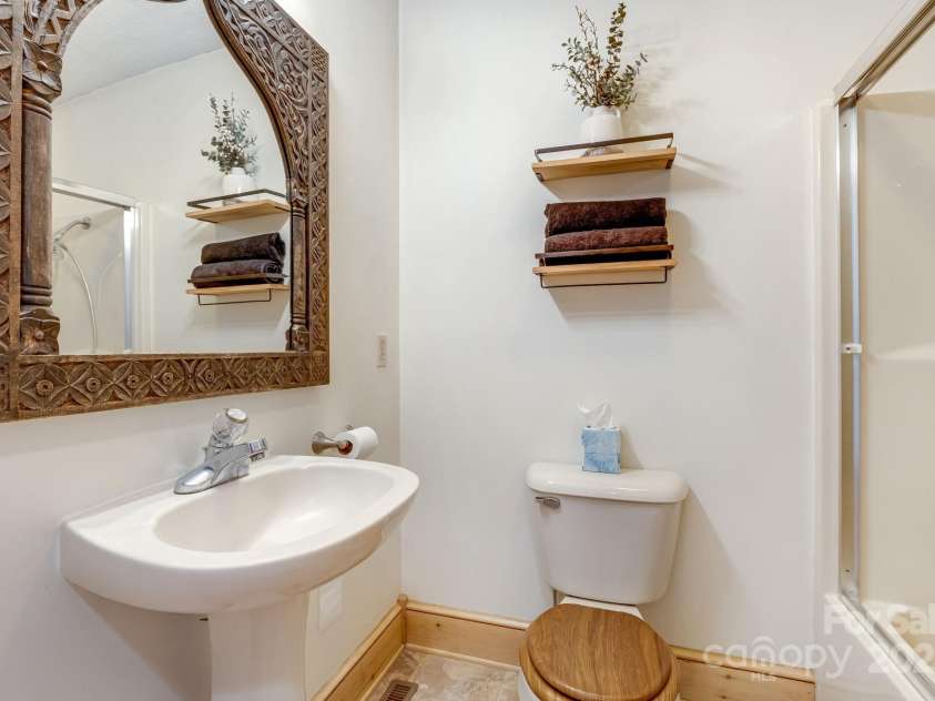 57 Stillwater Springs Road, Burnsville, NC 28714.  MLS# CAR4295423, YatesRealty ID 629. Bathroom 57 Stillwater Springs Road Burnsville, NC