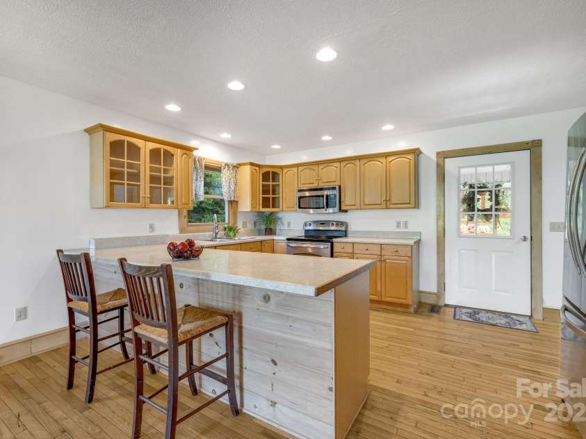 57 Stillwater Springs Road, Burnsville, NC 28714.  MLS# CAR4295423, YatesRealty ID 629. Kitchen 57 Stillwater Springs Road Burnsville, NC