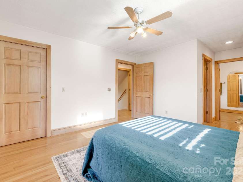 57 Stillwater Springs Road, Burnsville, NC 28714.  MLS# CAR4295423, YatesRealty ID 629. Primary Bedroom 57 Stillwater Springs Road Burnsville, NC