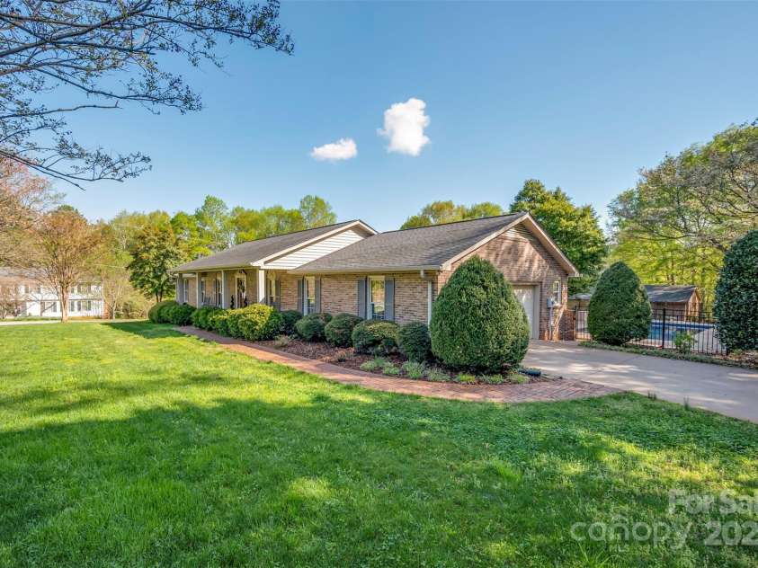 304 Mccall Drive, Forest City, NC 28043.  MLS# CAR4244301, YatesRealty ID 6291. Side of Home