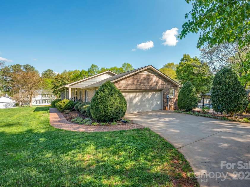 304 Mccall Drive, Forest City, NC 28043.  MLS# CAR4244301, YatesRealty ID 6291. Side of Home