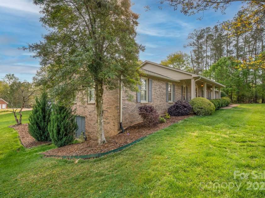304 Mccall Drive, Forest City, NC 28043.  MLS# CAR4244301, YatesRealty ID 6291. Side of Home