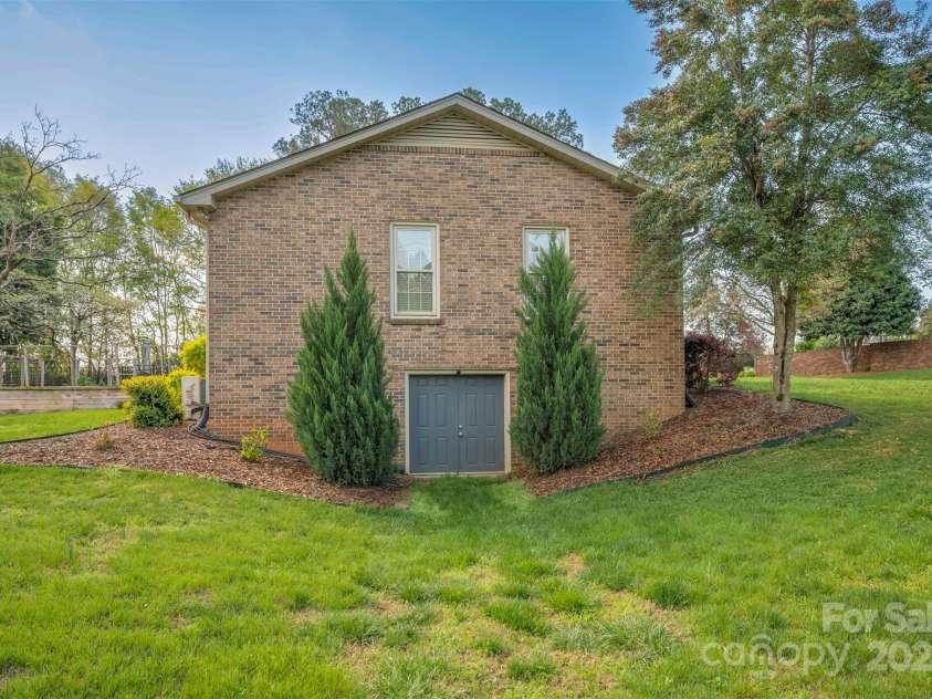 304 Mccall Drive, Forest City, NC 28043.  MLS# CAR4244301, YatesRealty ID 6291. Side of Home