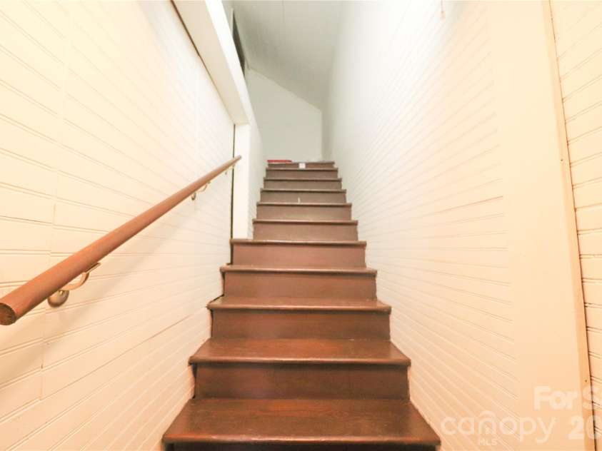 605 US 70 Highway, Hildebran, NC 28637.  MLS# CAR4321162, YatesRealty ID 6294. Stairs to attic