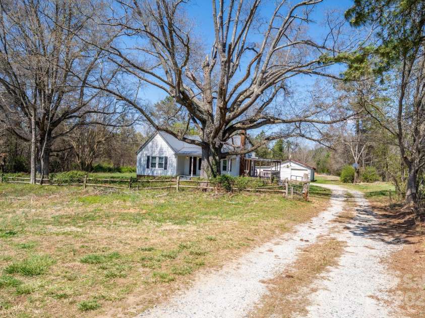 260 Penninger Drive, Woodleaf, NC 27054.  MLS# CAR4266246, YatesRealty ID 6296. Long Gravel Driveway