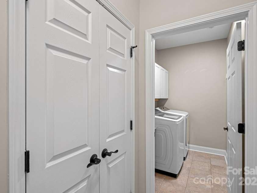 114 Runningdeer Drive, Mooresville, NC 28117.  MLS# CAR4231864, YatesRealty ID 6297. Laundry Room and Pantry