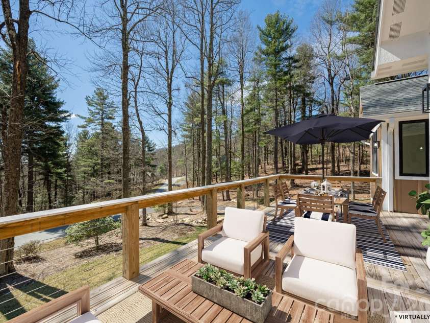 654 Hollybrook Drive, Flat Rock, NC 28731.  MLS# CAR4167426, YatesRealty ID 6299. Chat gpt