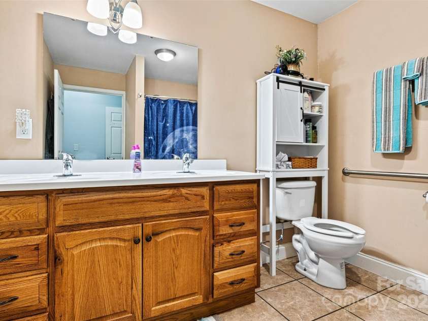 6051 Pointe West Lane, Vale, NC 28168.  MLS# CAR4092329, YatesRealty ID 63. Full bath on the main level