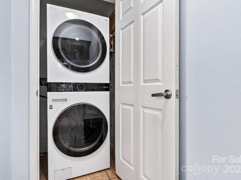 6051 Pointe West Lane, Vale, NC 28168.  MLS# CAR4092329, YatesRealty ID 63. Laundry area main level