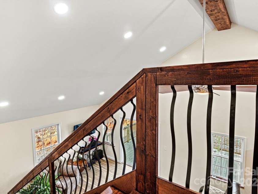 6051 Pointe West Lane, Vale, NC 28168.  MLS# CAR4092329, YatesRealty ID 63. Looking down into the living room