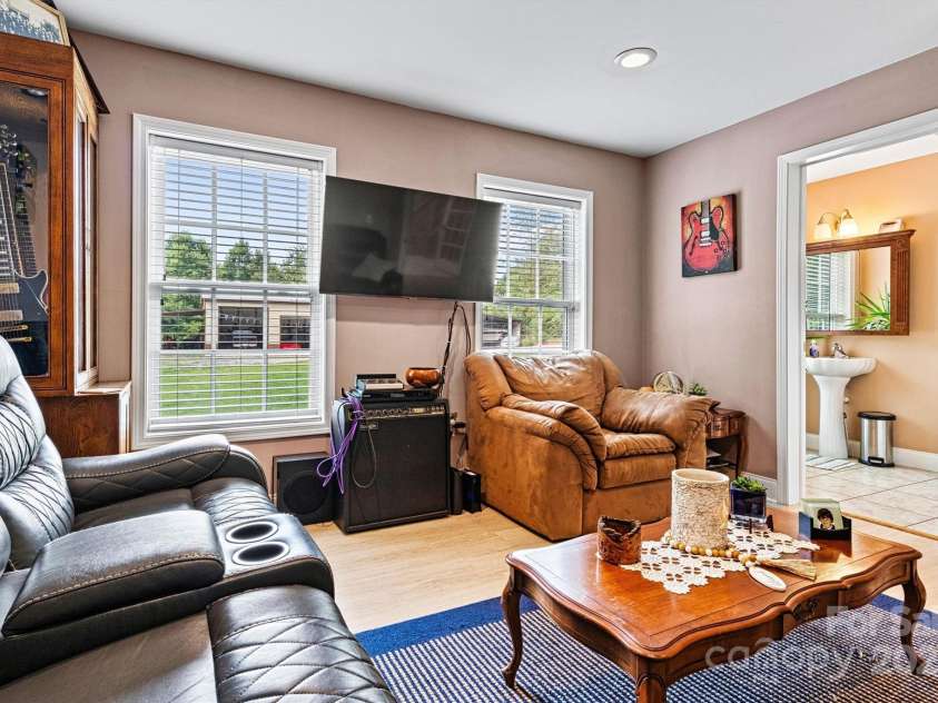 6051 Pointe West Lane, Vale, NC 28168.  MLS# CAR4092329, YatesRealty ID 63. Main level bedroom, currently being used as a den