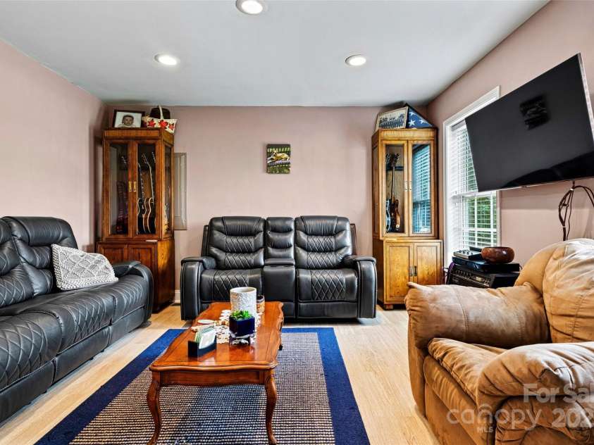 6051 Pointe West Lane, Vale, NC 28168.  MLS# CAR4092329, YatesRealty ID 63. Main level bedroom, currently being used as a den