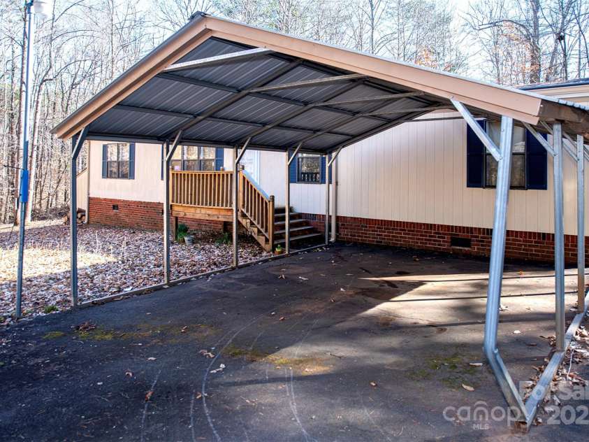 237 Creekstone Lane, York, SC 29745.  MLS# CAR4227284, YatesRealty ID 6301. Double parking carport
