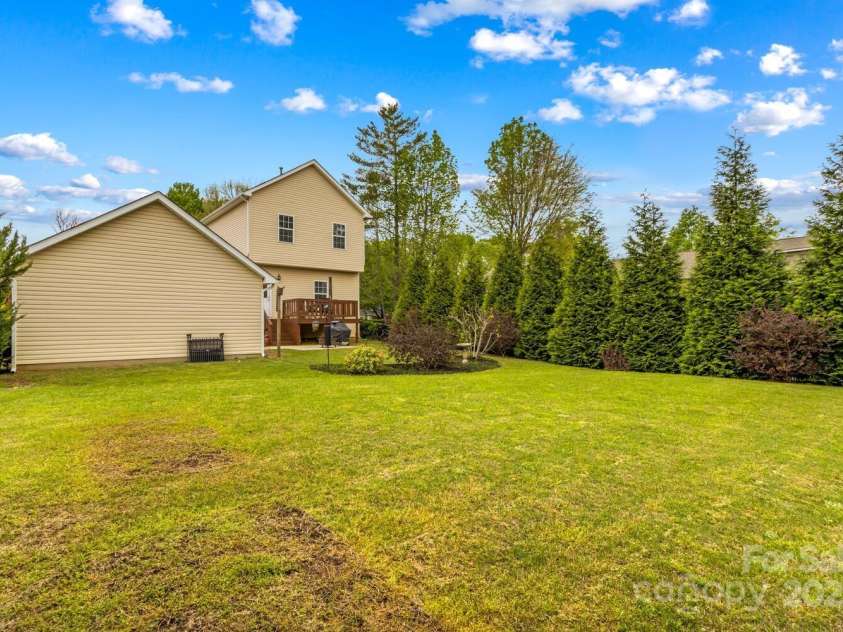 12746 Bravington Road, Huntersville, NC 28078.  MLS# CAR4245023, YatesRealty ID 6302. Enjoy meals or just relax in this backyard oasis.