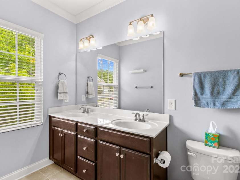 12746 Bravington Road, Huntersville, NC 28078.  MLS# CAR4245023, YatesRealty ID 6302. Full bath with a large walk-in shower.