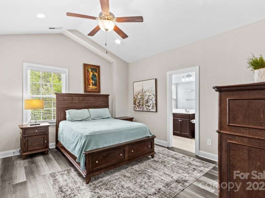 12746 Bravington Road, Huntersville, NC 28078.  MLS# CAR4245023, YatesRealty ID 6302. The primary bedroom has vaulted ceilings and two separate closets.