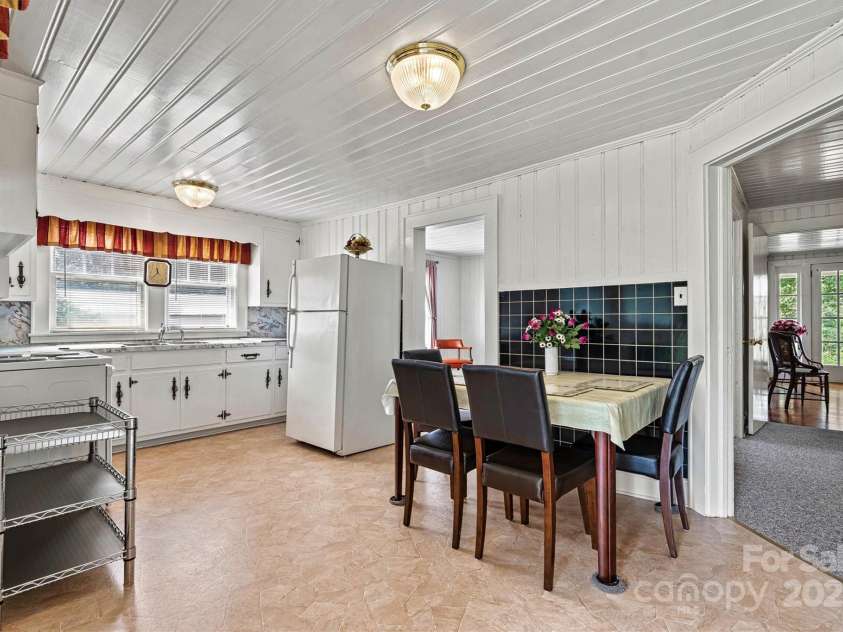 128 10th Street, Hildebran, NC 28637.  MLS# CAR4184496, YatesRealty ID 6303. Kitchen and Breakfast Area/Window View