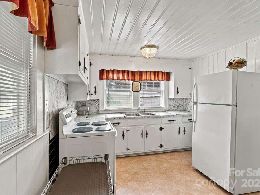 128 10th Street, Hildebran, NC 28637.  MLS# CAR4184496, YatesRealty ID 6303. Kitchen Focused/Window View