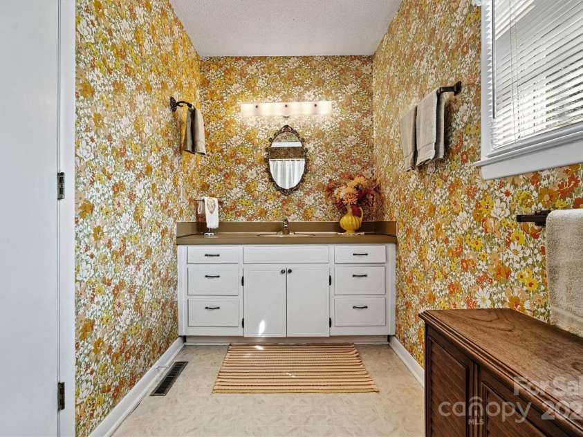 128 10th Street, Hildebran, NC 28637.  MLS# CAR4184496, YatesRealty ID 6303. Primary Bedroom Private Bath/Vanity View