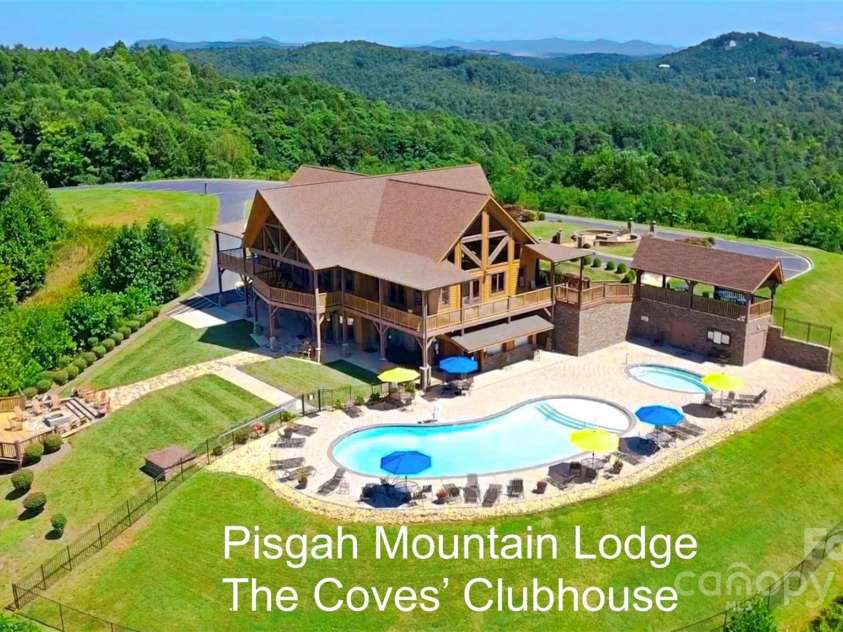 1895 Cypress Trail, Lenoir, NC 28645.  MLS# CAR4215921, YatesRealty ID 6304. Pisgah Lodge is the crown jewel of The Coves, a post and beam chalet with vaulted ceilings, 3 sided fireplace, full kitchen, pool table loft, fitness center, locker rooms, salt water pool, picnic areas, fire-pits, decks and