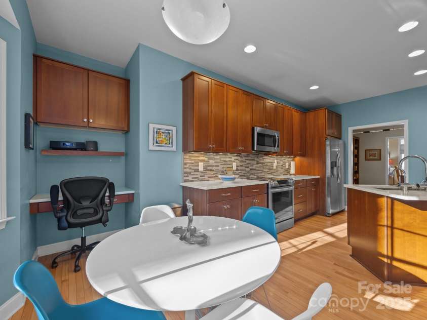 43 Golden Pond Way, Hendersonville, NC 28791.  MLS# CAR4234066, YatesRealty ID 6305. Breakfast room looking into the kitchen