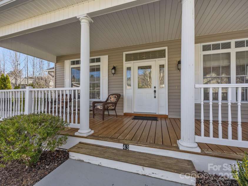43 Golden Pond Way, Hendersonville, NC 28791.  MLS# CAR4234066, YatesRealty ID 6305. Southern inspired broad, covered front porch